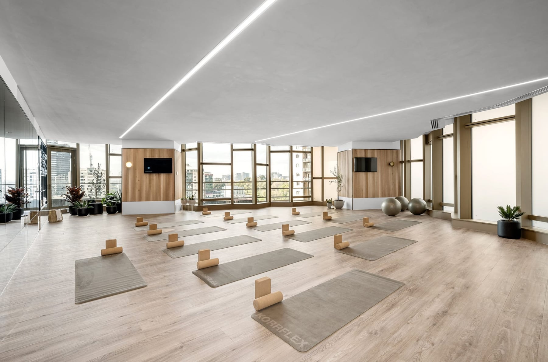 A gymnasium and wellness centre with yoga and Pilates equipment