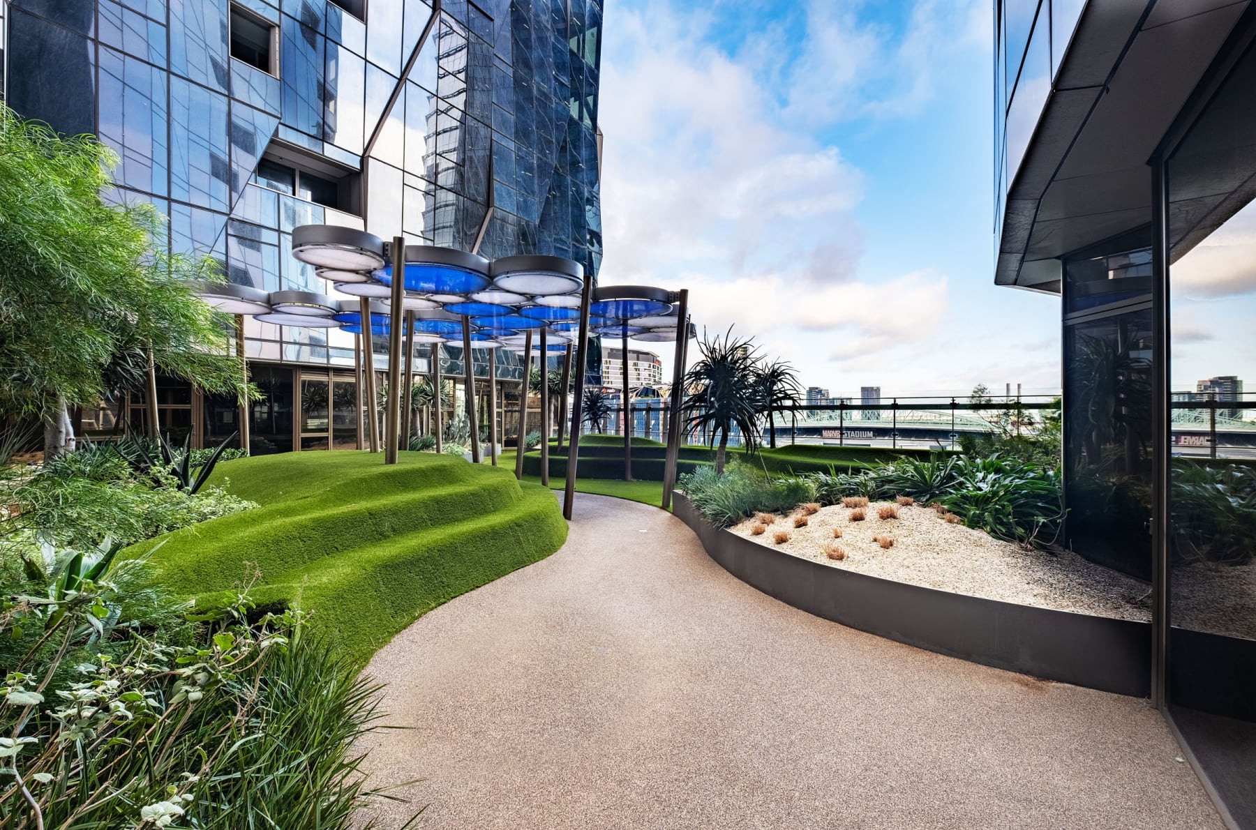 An outdoor rooftop terrace with BBQ facilities